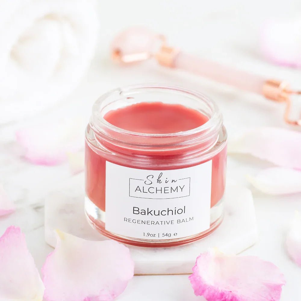 Pink face balm in a jar on a white background