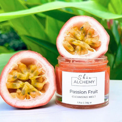 Face cleanser in a jar with passion fruit and green leaves
