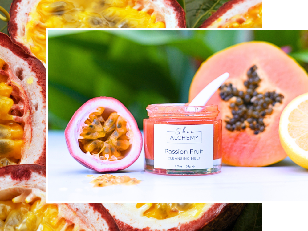 Jar of 'Shine Alchemy' passion fruit product with passion fruit and lemon in the background