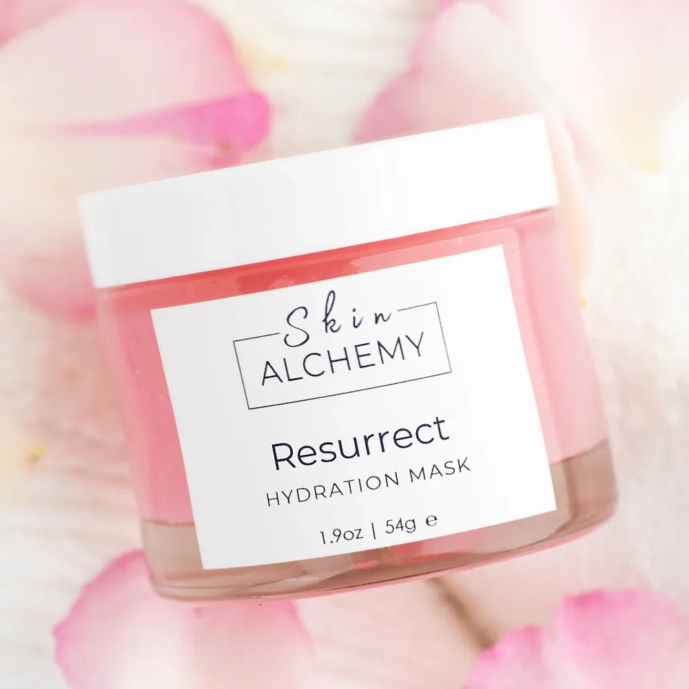 Pink Face mask in a jar on a bed of rose petals