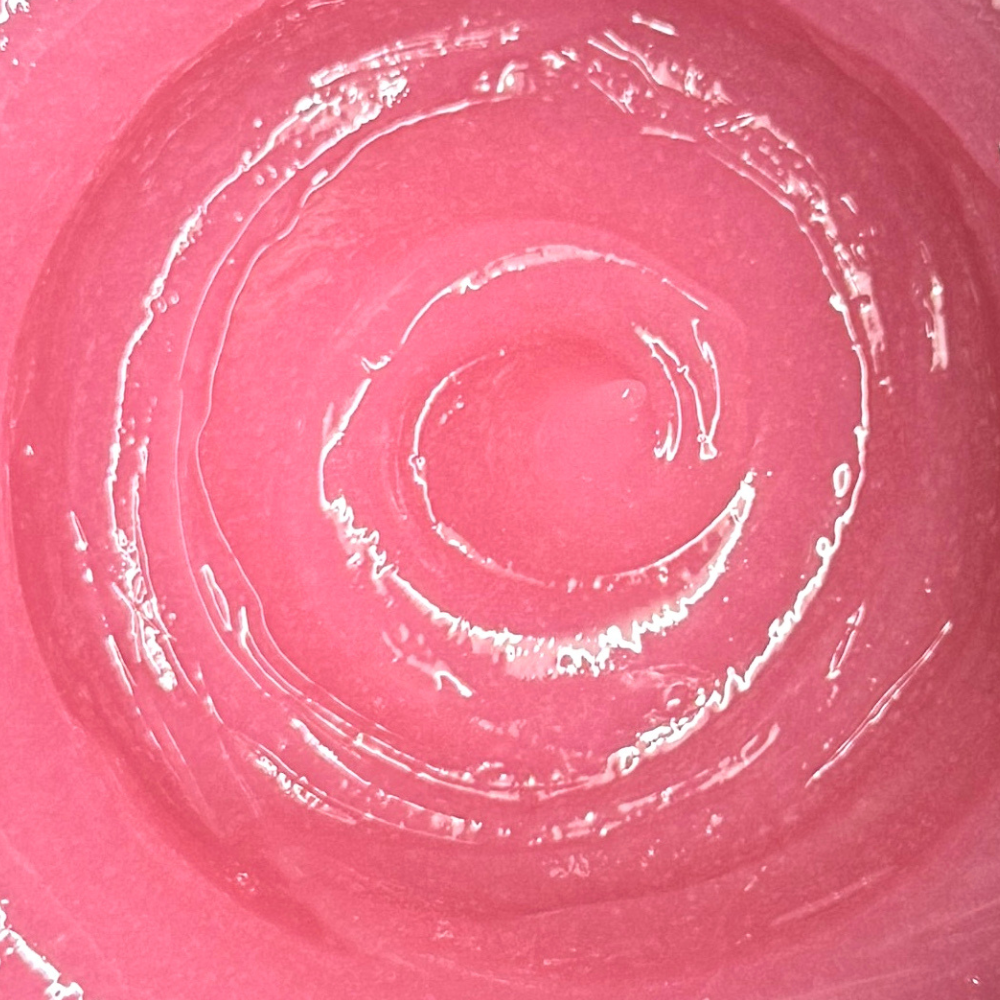 Pink circular pattern of gel texture